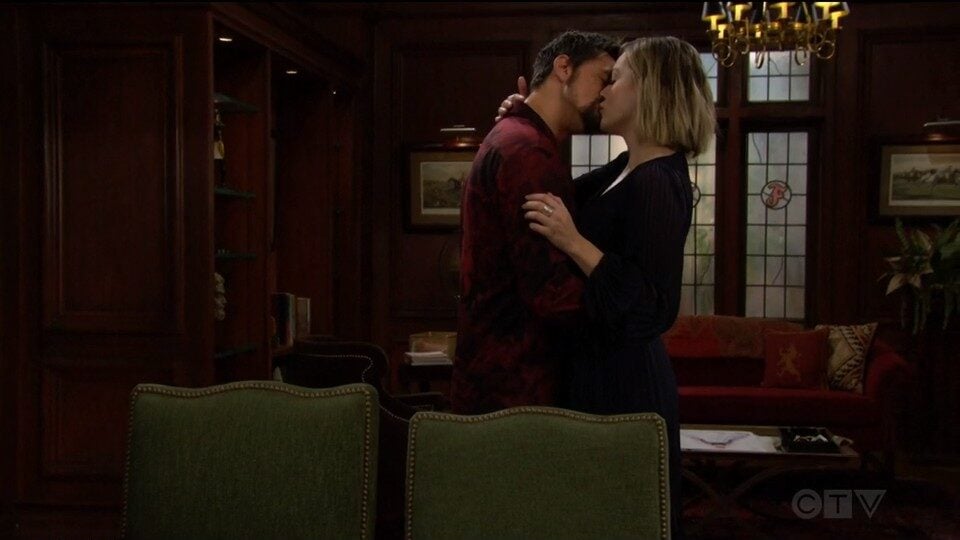 hope and thomas kiss in office
